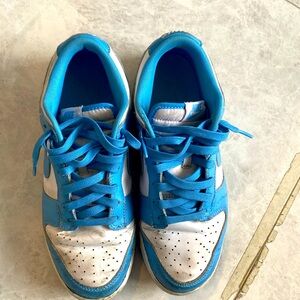 Nike air forces. Blue and white. Used excellent condition. Size 7.5 boys.